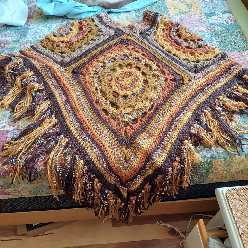 Elegant Crochet Cape with Fringe